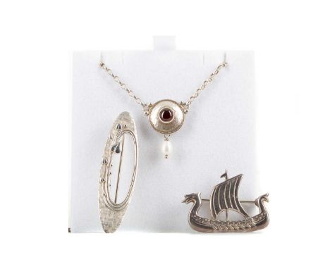 GARNET AND PEARL PENDANT BY OLA GORIE,along with a pair of earrings and a Viking longship brooch, each by Ola Gorie and one o