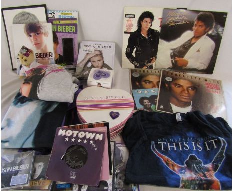 Collection of memorabilia relating to Justin Bieber and Michael Jackson inc LPs, clothing, mug etc