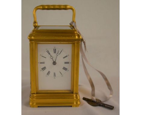 19th century French carriage clock in a gilded gorge case