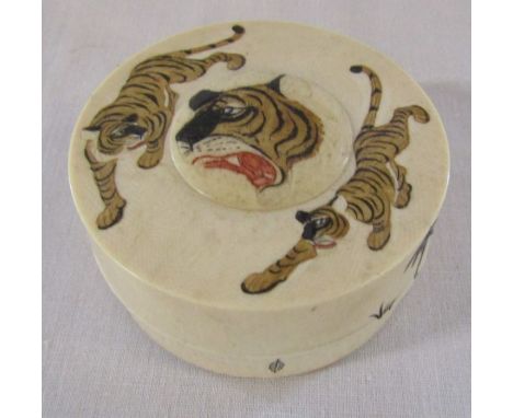 Early 20th century ivory trinket pot with tiger decoration D 6.5 cm H 3.5 cm (base plate needs reattaching)