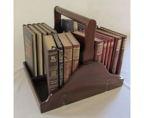 Wooden book trough with assorted books