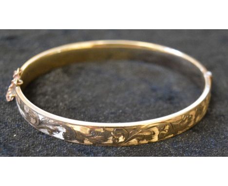 AMENDED DESCRIPTION 9ct gold plated bangle stamped 9ct metal core