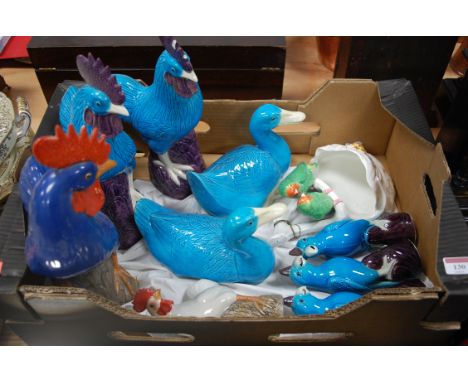 A box of assorted modern glazed ceramic animal figures to include; ducks and cockerels etc 