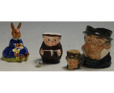 A Royal Doulton character jug 'Captain Cuttle'; together with a miniature Royal Doulton character jug; a Goebel character jug