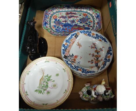 A box of miscellaneous china to include five 19th century Chinese export tin glazed plates, ceramic cow creamer, continental 