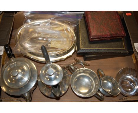 An early 20th century hammered Cornish pewter four piece tea service by James Dixon & Sons of Sheffield; together with loose 