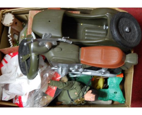 A collection of loose and playworn Action Man and Cherilea dolls clothing and accessories to include motorcycle and sidecar