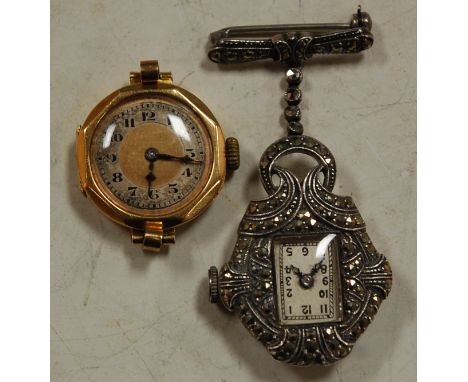 A ladies silver cased and marcasite set fob watch and one other gold cased ladies wrist watch with manual wind movement (lack