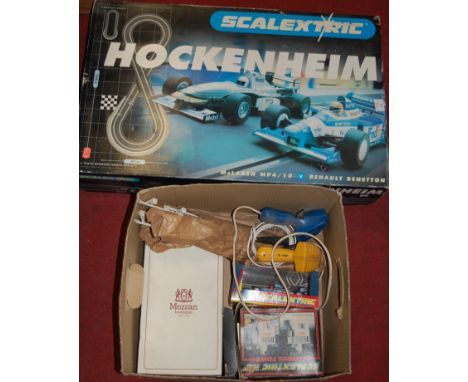 A boxed Scalextric Hockenheim racing set together with various loose Scalextric accessories