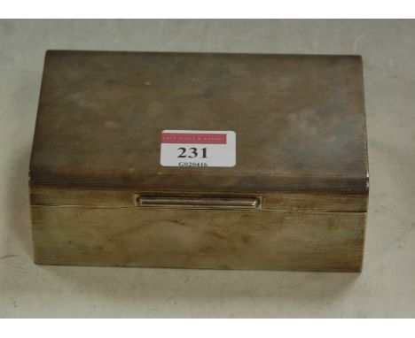 An early 20th century silver cigarette box, having all-over engine turned decoration Condition Report / Extra Information w.1