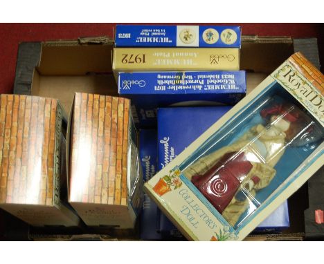 Three Royal Doulton boxed collectors dolls; together with various boxed Goebel annual plates