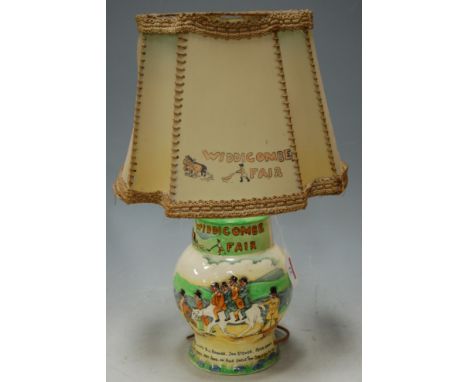 A mid 20th century Crown Devon fieldings Widdecombe Fair table lamp and shade