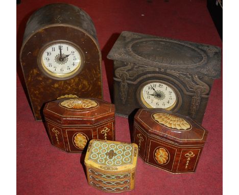 An early 20th century lithograph printed tin cased mantel clock together with one other similar, pair of lithograph printed b