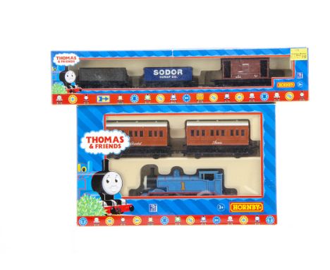 Hornby 00 Gauge Thomas the Tank Engine Train and Truck Packs, R9087 comprising blue 0-6-0 Thomas, Annie and Clarabel, R9092 c