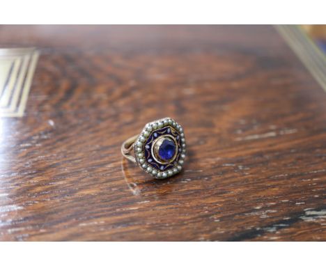 A 19th century yellow metal, sapphire, seed pear and three colour enamel set octagonal dress ring, size K.