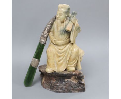 A 19th century hardstone carved sage on stand and a jade letter opener