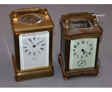 An early 20th century brass repeating carriage clock, retailed by Dent and one other brass carriage timepiece.