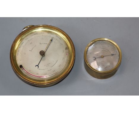 An E. J. Dent aneroid barometer and a Negretti and Zambra aneroid barometer