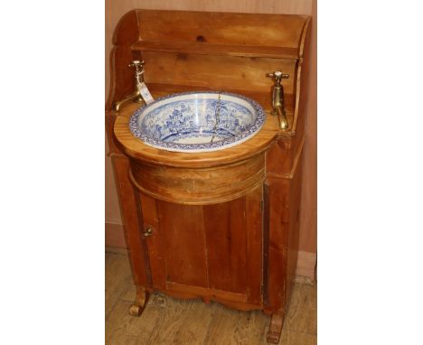 A 19th century pine washstand with blue and white panorama basin H.106cm