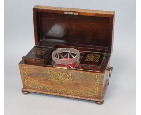 A George IV brass inlaid rosewood tea caddy and associated sugar bowl length 31cm