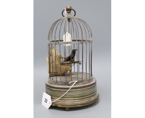 A brass musical automaton bird cage