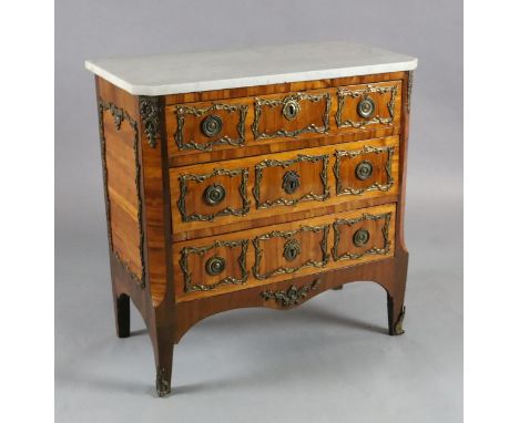 A 19th century French Louis XVI style ormolu mounted kingwood commode, with white marble top and three long drawers, on squar