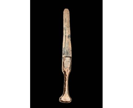 Ca. 1200 - 800 BC. A bronze dagger made using the lost wax casting technique. It has a slender blade, rectangular guard, all 