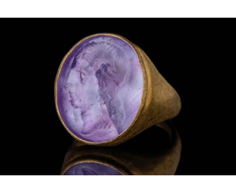Ca. AD 50 - 100.An amethyst intaglio depicting a portrait of an empress, possibly Agrippina the Younger, mother of Emperor Ne
