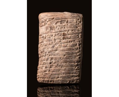 Ca. 2200 - 1900 BCA Sumerian hand-built clay tablet of rectangular form containing about seventeen lines of cuneiform text on