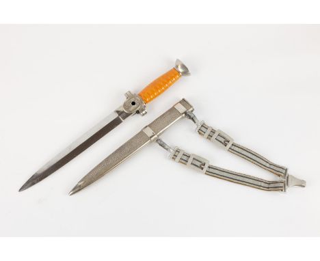 A Third Reich Red Cross Social Welfare Leader's dagger, the hilt with orange grip and nickel plated mounts, in its plated met