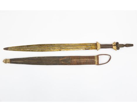 A good African Mandara sword, blade 21½" with elaborate punched decoration overall, the grip covered with plaited leather and