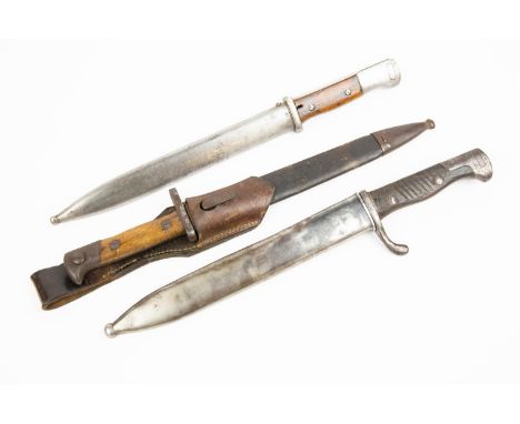 3 German Mauser bayonets: K98, blade marked "44 FNJ", a Model 1871/84 with leather frog, blade marked "C.S. Schilling Suhl"; 