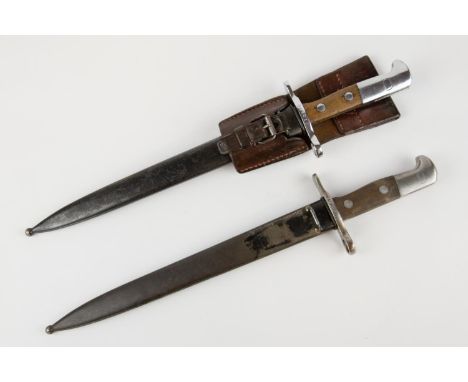 A Swiss M1889/99 bayonet for the Schmidt Rubin rifle, in its black painted steel scabbard (paint worn); and a Swiss M1918 bay