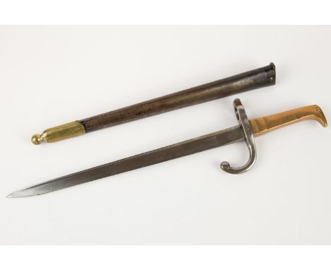 An unusual continental sword bayonet, Gras type blade 12¼", marked "SL( in circle)Mre De St Etienne", brass hilt with coat of