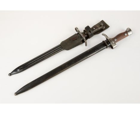 A French model 1892/1915 bayonet, with wood grips, in its steel scabbard; also a Finnish Model 1927 bayonet, the blade marked