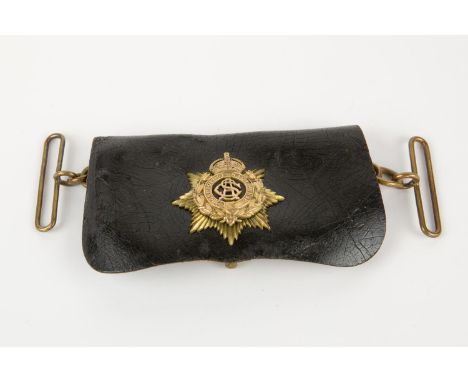 A post 1902 Army Service Corps officer's leather cross belt pouch, with brass badge and fittings. GC (slightly squashed, pate