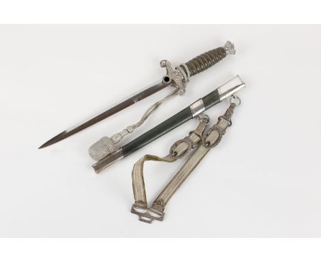 A good scarce Third Reich Land Customs silver plated dagger, by W.K.C. Solingen, with wire bound leather covered grip and sil