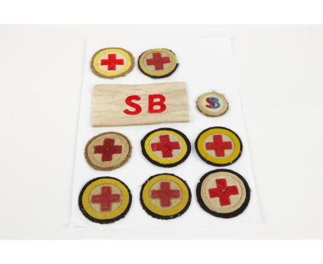 10 British army WW1 medical badges. 8 x red cross in circle, stretcher bearer armband plus stretcher bearer cloth patch. £80-