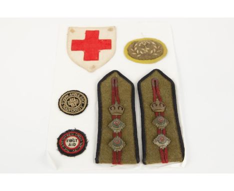 WW1 British cloth insignia, including Red Cross, St John, FANY arm badge and pair of epaulettes 6 pieces. £80-150 