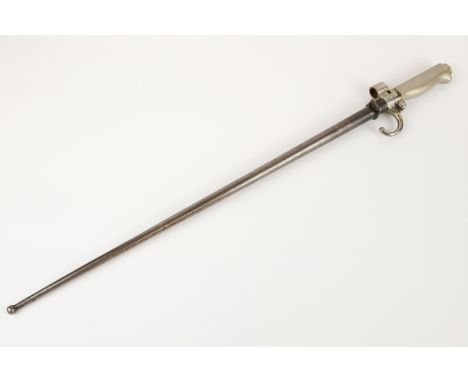 A French M1886 bayonet, with curved quillon and round spring catch, in its scabbard. GC (slight pitting to hilt). £60-80 