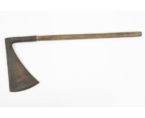 A large old "executioner's" type axe, depth of blade 13½", maximum width of blade 7½", with 8" socket, on its wooden haft, 34