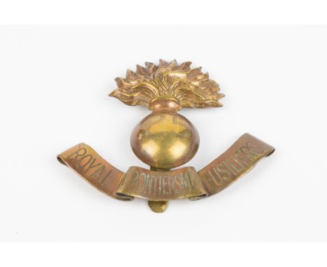 "Kitchener's Army" locally made cap badge of the 25th Bn the Royal Fusiliers, consisting of a Grenadier Guards cap badge engr