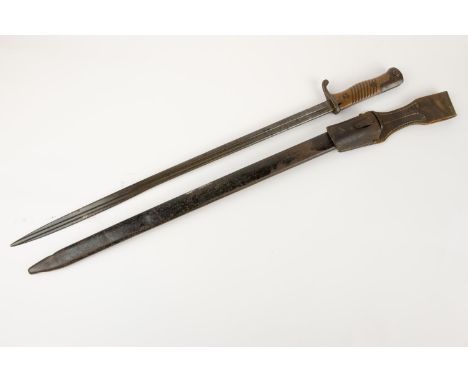 A German Seitengewehr Model 1898 bayonet, slender blade 20¼" by "WK&amp;C", the hilt having one piece ribbed wooden grip, the