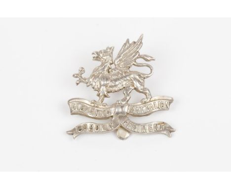 WWI "Kitchener's Army" silver cap badge of the 11th (Lonsdale) Bn. The Border Regiment, HM London 1914 with maker's mark "SG"