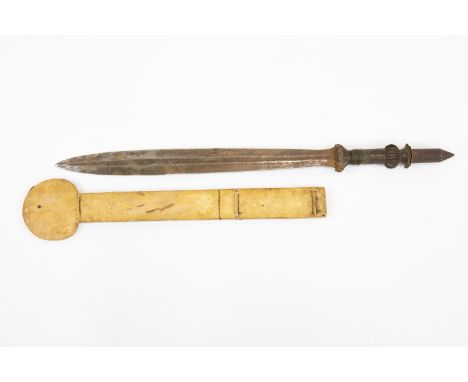 An African sword of the Yaka tribe, leaf shaped blade 19" with simple punched decoration, the hilt with wire bound grip and l