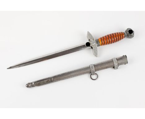 A Third Reich 2nd pattern Luftwaffe officer's dagger, by WKC, Solingen, with wire bound orange plastic grip, in its scabbard.