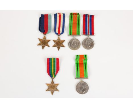 Four: 1939-45 star, F&amp;G star, Defence and War medals, in RAOC carton to R. Thomas, VF; single Pacific star, Defence medal