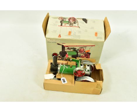 A BOXED MAMOD LIVE STEAM TRACTION ENGINE, No. TE1a, complete with all accessories including boxed fuel and steering attachmen
