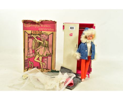 A BOXED SINDY'S OWN WARDROBE, appears complete and in fairly good condition, with Sindy Set and Hair Switch leaflets,(damaged