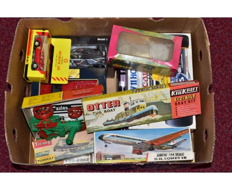 A QUANTITY OF UNBUILT AND PART BUILT PLASTIC CONSTRUCTION KITS, contents not checked for completeness, unbuilt vintage Revell